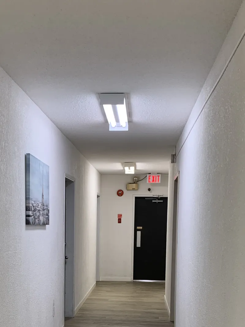 Hallway before renovation at College Drive